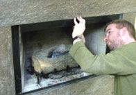 Align valance in center of your firebox. Be sure front of the valance is flush with outer edge of firebox and that the two center holes face the roof of your firebox. Mark the location of the two holes with a pencil.