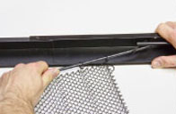 To install right side panel, be sure pull side of the screen is towards middle of the firebox.  Then insert straight end of rod through the center rod holder hook farthest away from the right side (It will be a straight line from the rod hook on the end of the right side valance extension). Slide rod through the hook until there is enough room to insert the right angle end of the rod onto rod hook at the end of the valance extension.